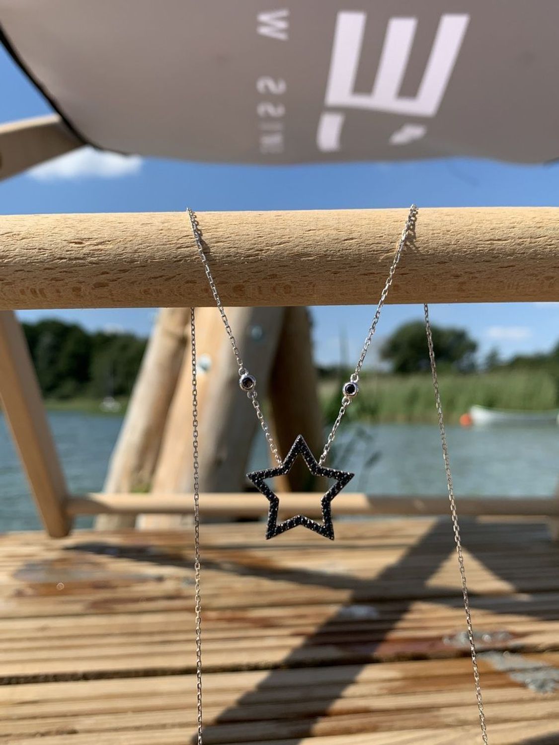 Naszyjnik srebrny gwiazdka z czarnymi cyrkoniami Dall'Acqua N BY 191 087.jpg